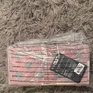 Striped Pink and White Cosmetic Pouch